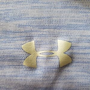Under Armour HeatGear 1/4 zip, long sleeve top.  Blue and pink heathered color.